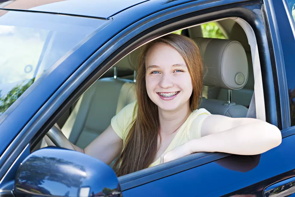 Teenage girl learning to drive