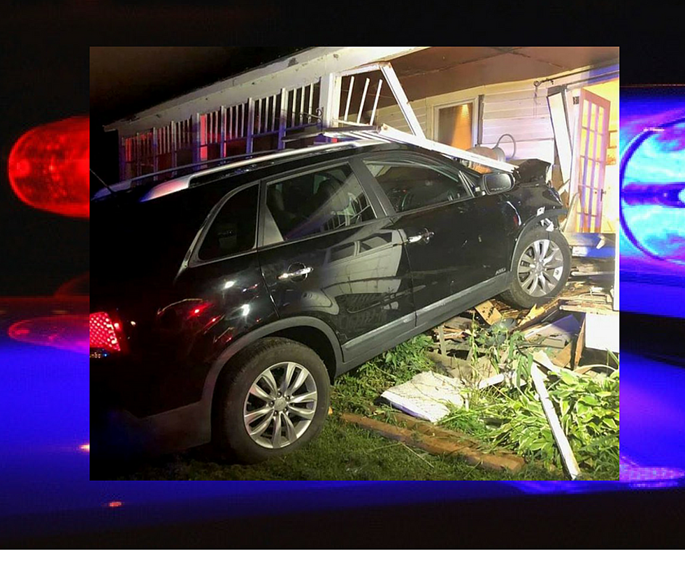 Driver Crashes into House; Charged with OUI [PHOTO]
