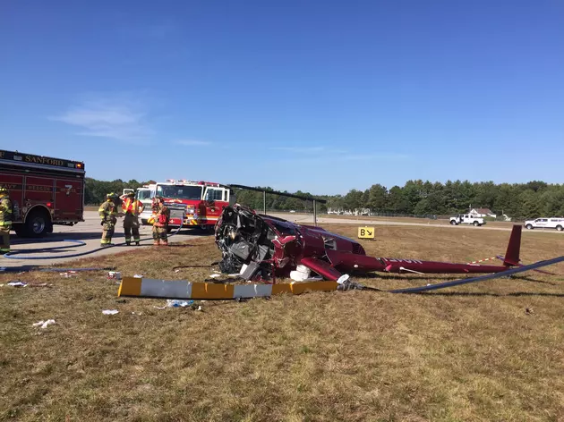 Helicopter Crashes in The Grass Adjacent to Airport Runway