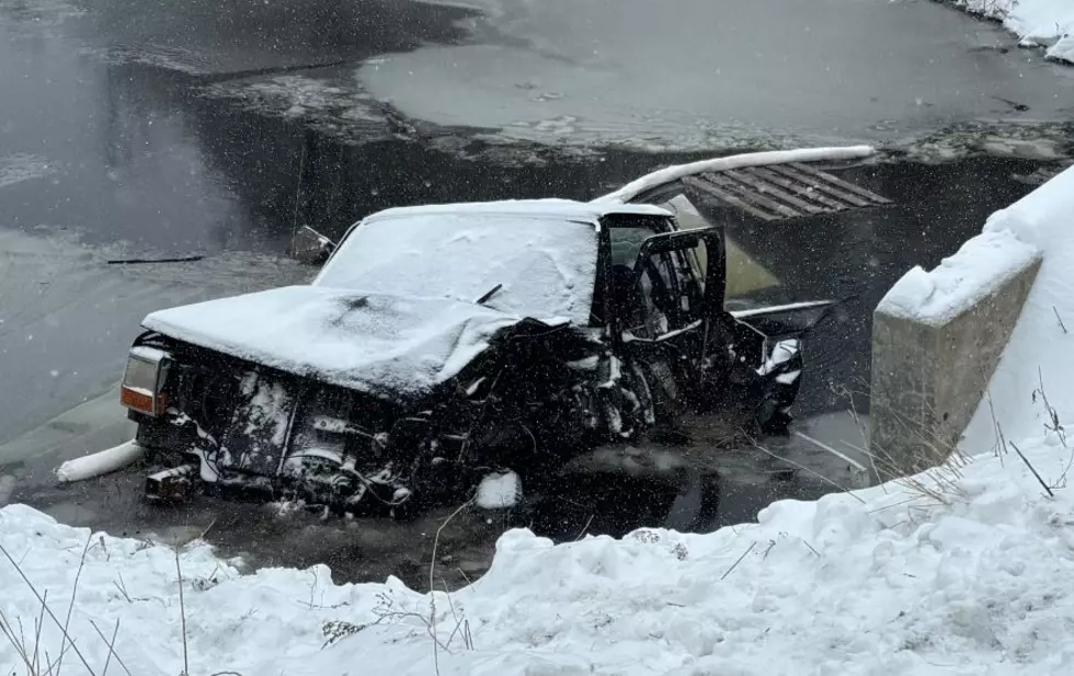 Pickup Crashes in Lake after Colliding with Plow Truck in Maine