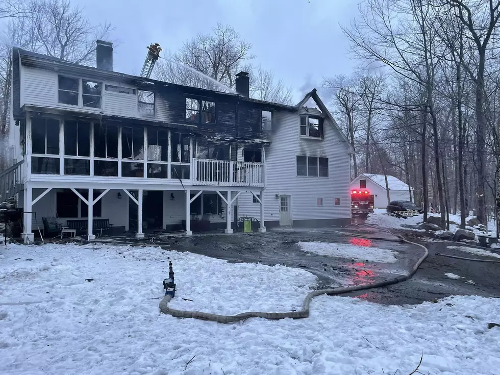 Firefighters Battle Large House Fire in Maine