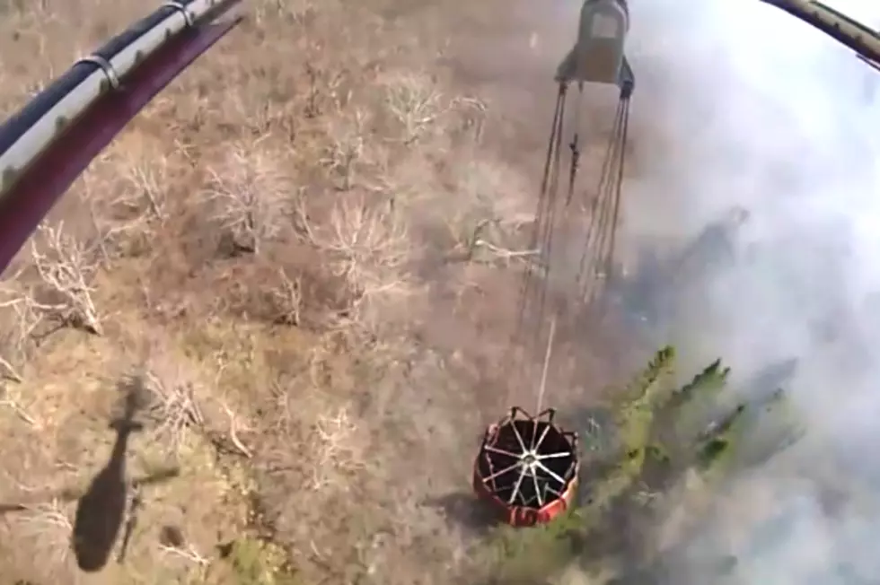 View From Helicopter Dumping Water on Lubec Wildfire [VIDEO]