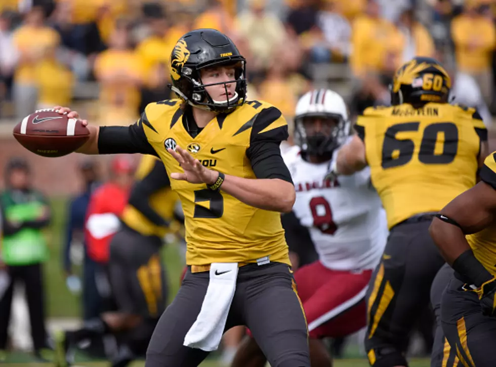 COLUMBIA , MO - OCTOBER 3: Drew Lock #3 of the Missouri Tigers drops back and passes against the South Carolina Gamecocks in the first quarter at Memorial Stadium on October 3, 2015 in Columbia, Missouri. (Photo by Ed Zurga/Getty Images)