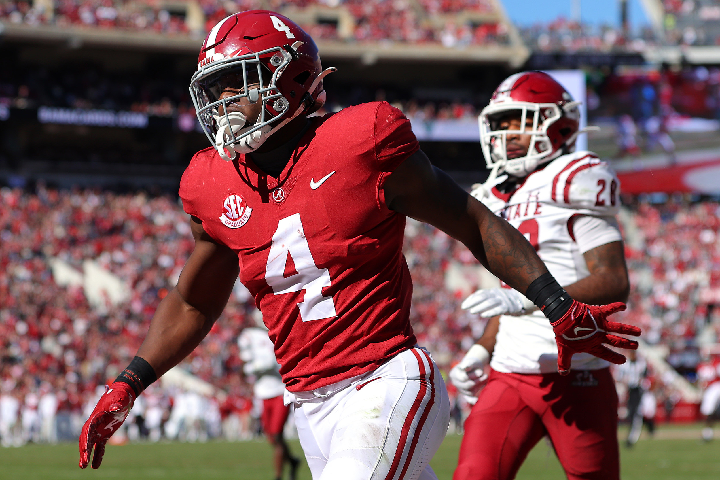 Washington Commanders running back Brian Robinson Jr. (8) runs with the  ball against the New York