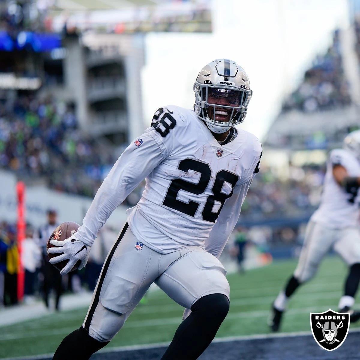 Oakland Raiders running back Josh Jacobs (28) celebrates after