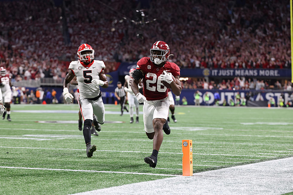 Tide Triumphs  Over Dogs to Win SEC