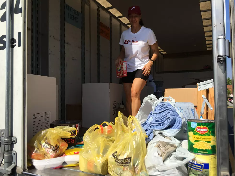 UA Gymnastics Coach Fills Trucks with Flood Relief Supplies [PHOTOS]