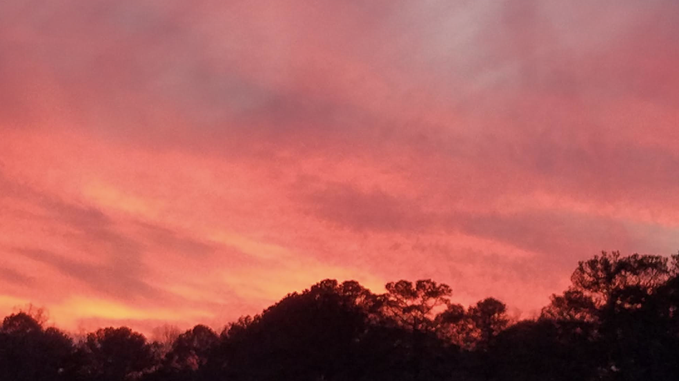 A Crimson Sky in Tuscaloosa, Storms Thursday