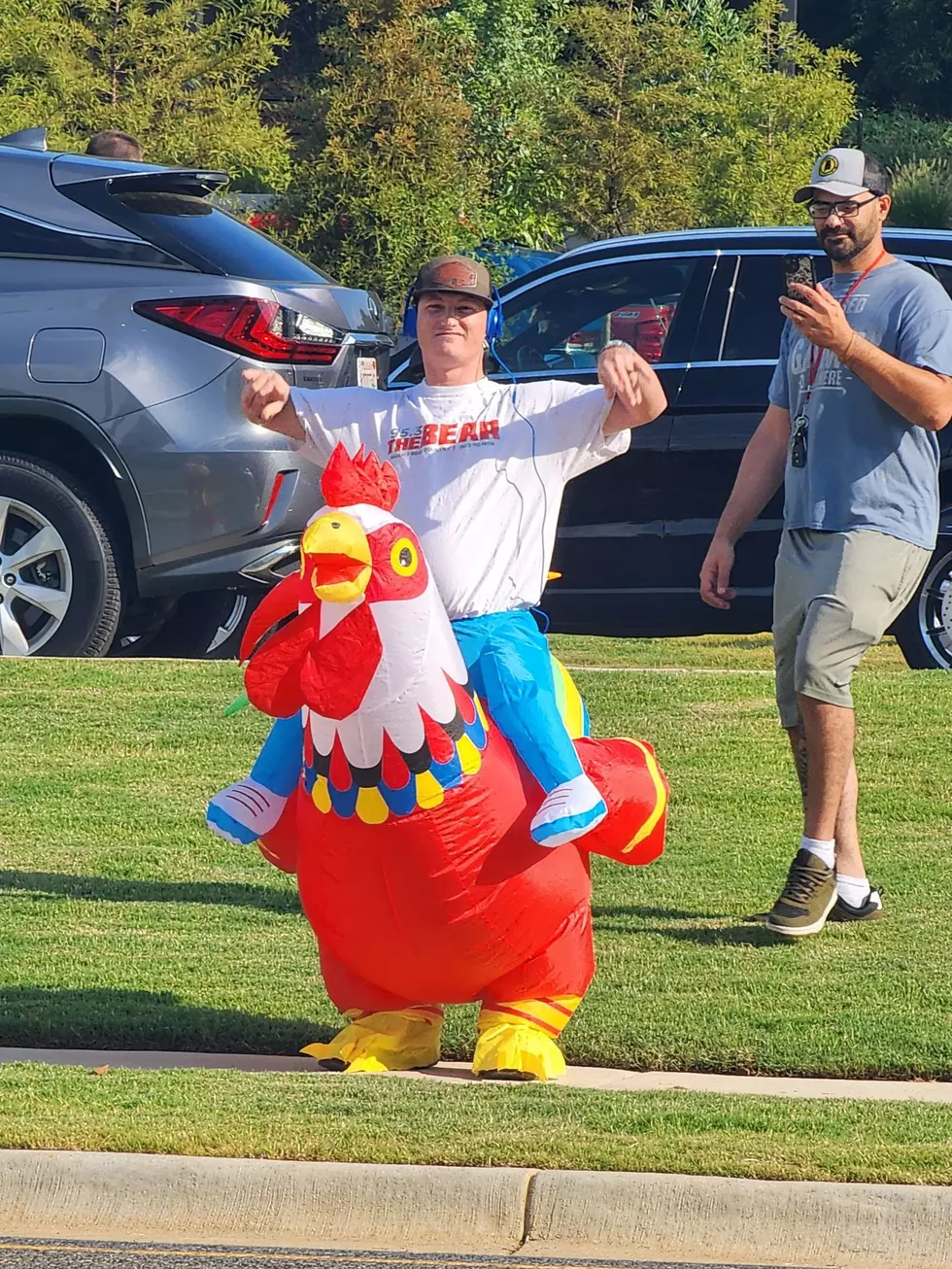 Steve & DC Hold One Man Anti PETA Protest Outside New Raising Canes.