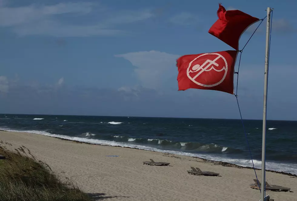 Know Before You Go: Understanding the Warning Flag System of Alabama Beaches
