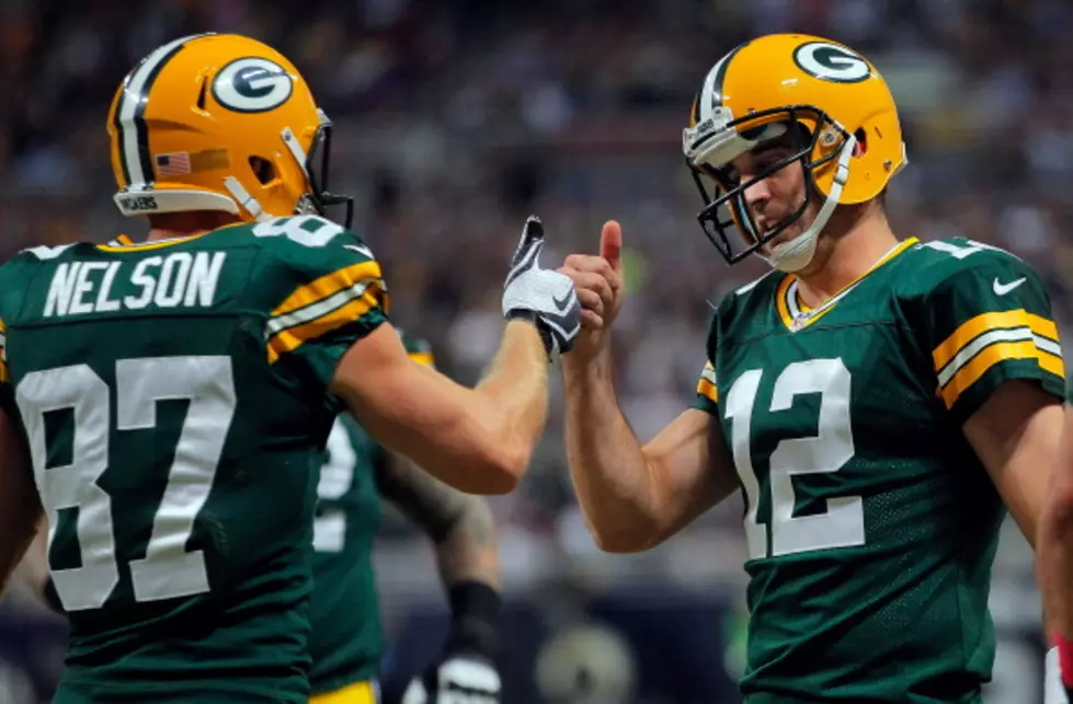 Rodgers Throws 3 TDs As Packers Upend Rams