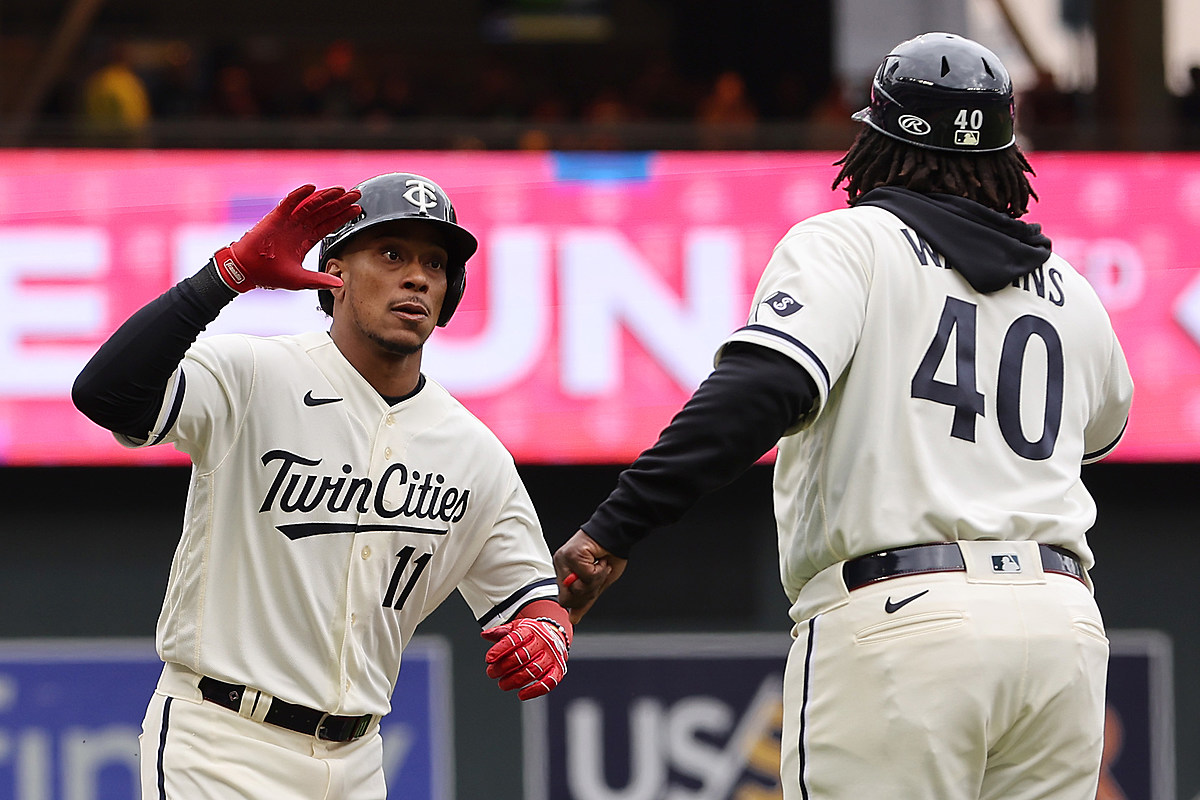 Minnesota Twins' Jorge Polanco is hoisted by Miguel Sano after Polanco  drove in the winning run in the ninth inning of a baseball game against the  Chicago White Sox on Tuesday, May
