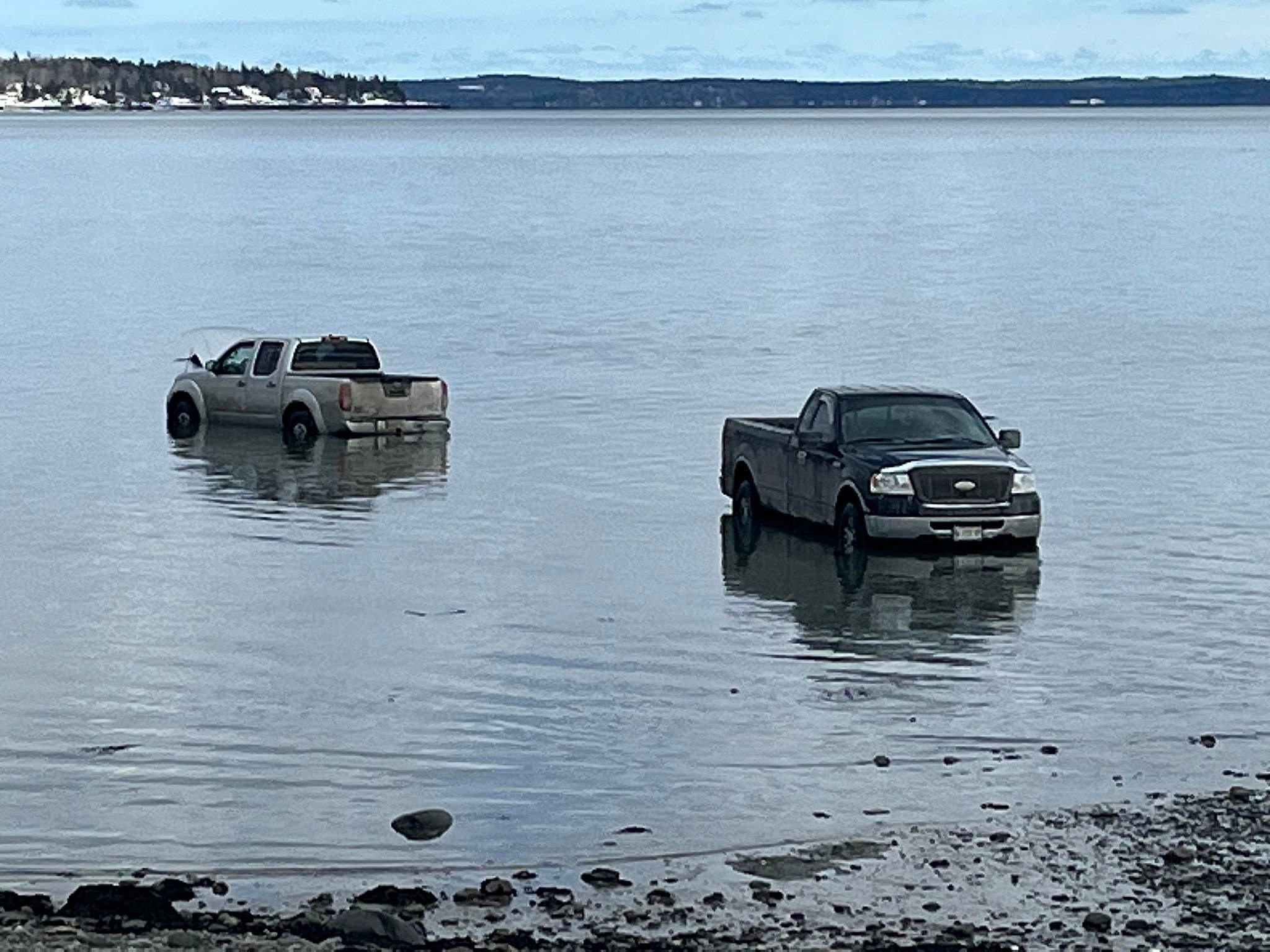 North Bay news: Pickup truck falls through the ice on Lake