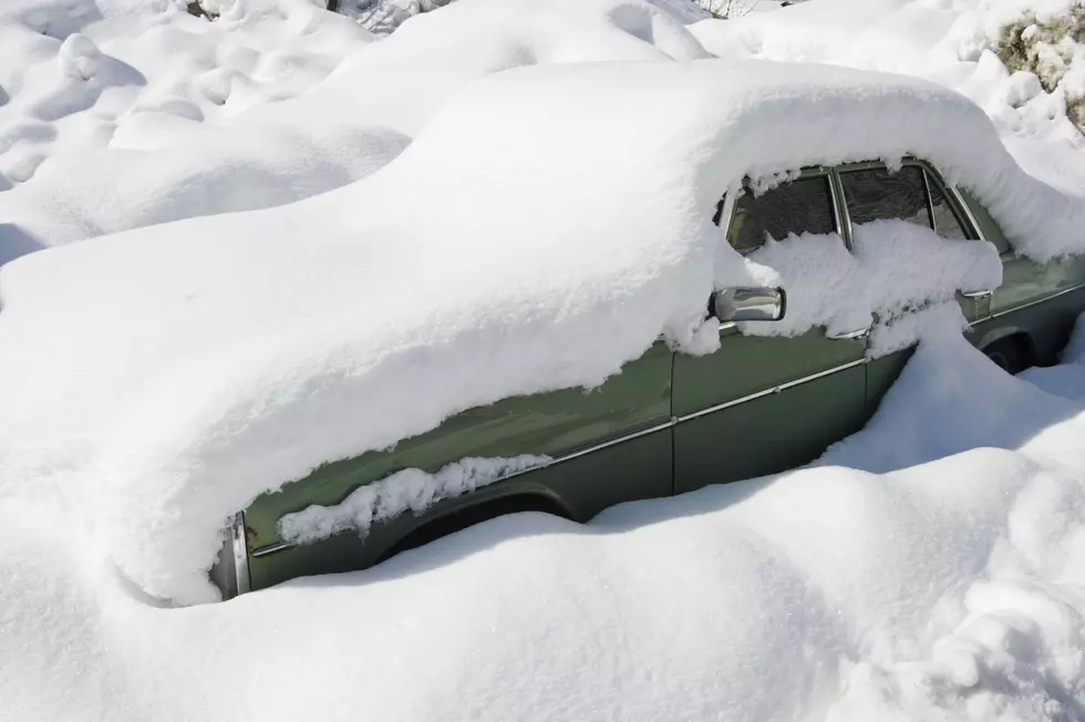 Car buried in snow