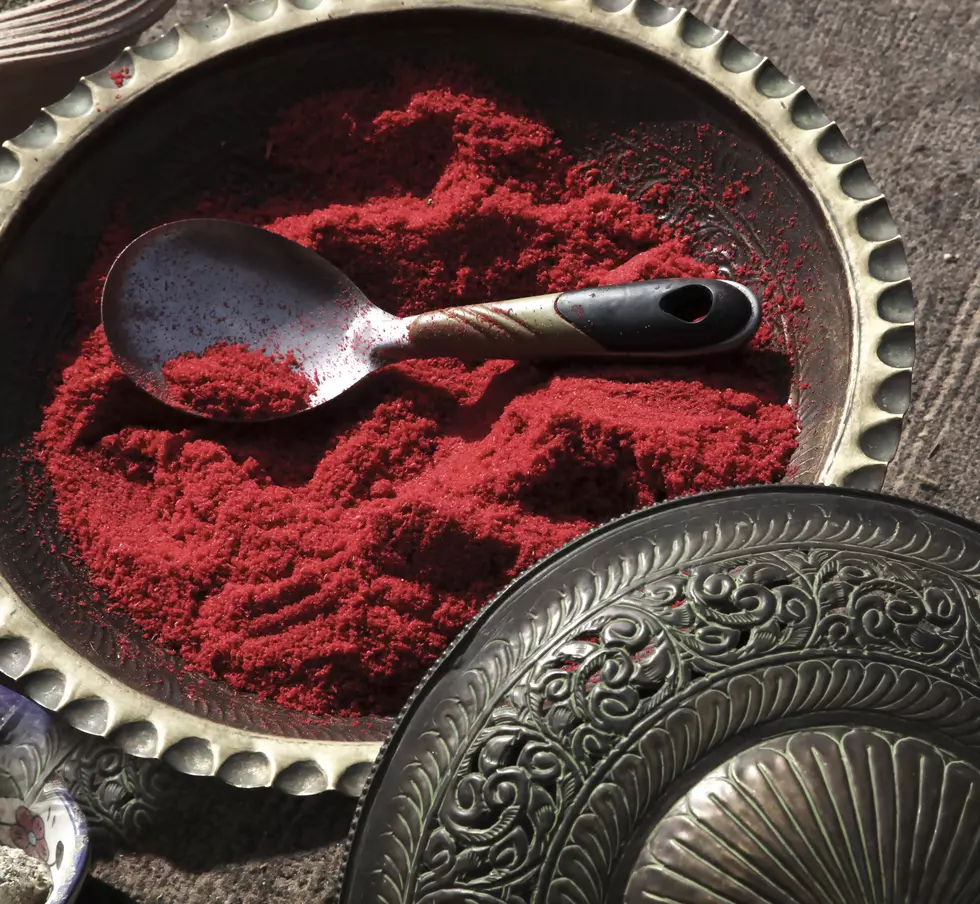 Red sumac spice in ornate middle eastern bowl