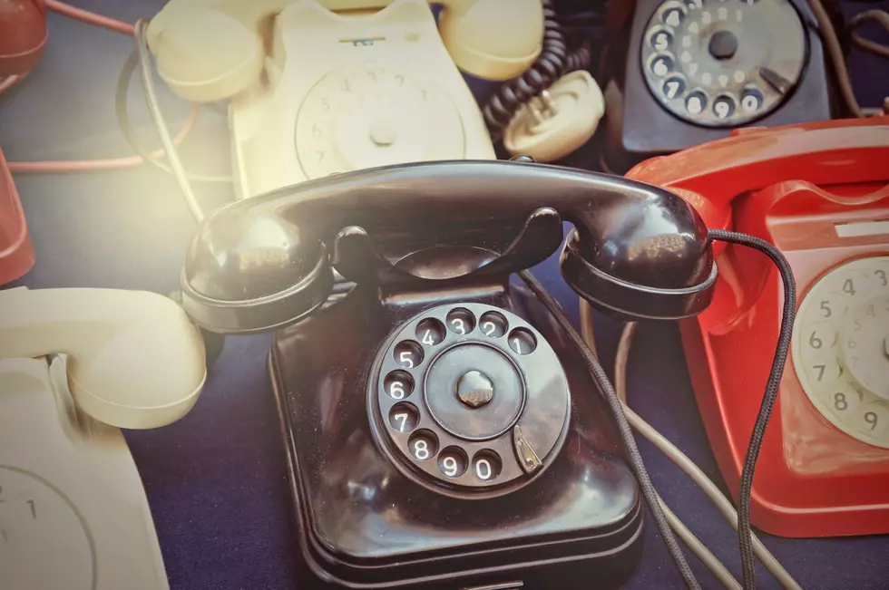 Old dialing telephones at a flea market