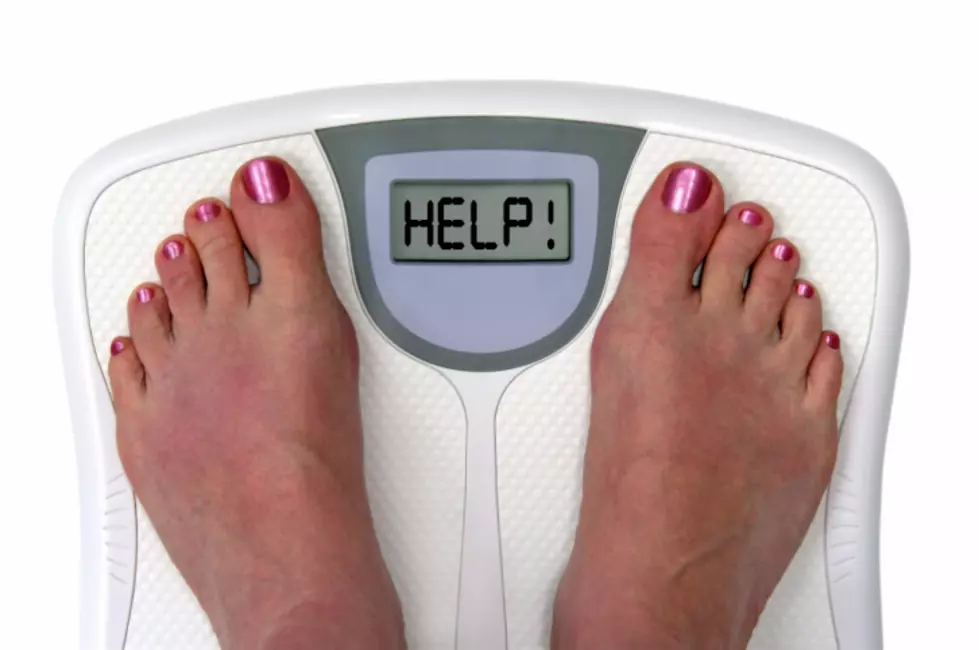 Feet on a bathroom scale - Isolated
