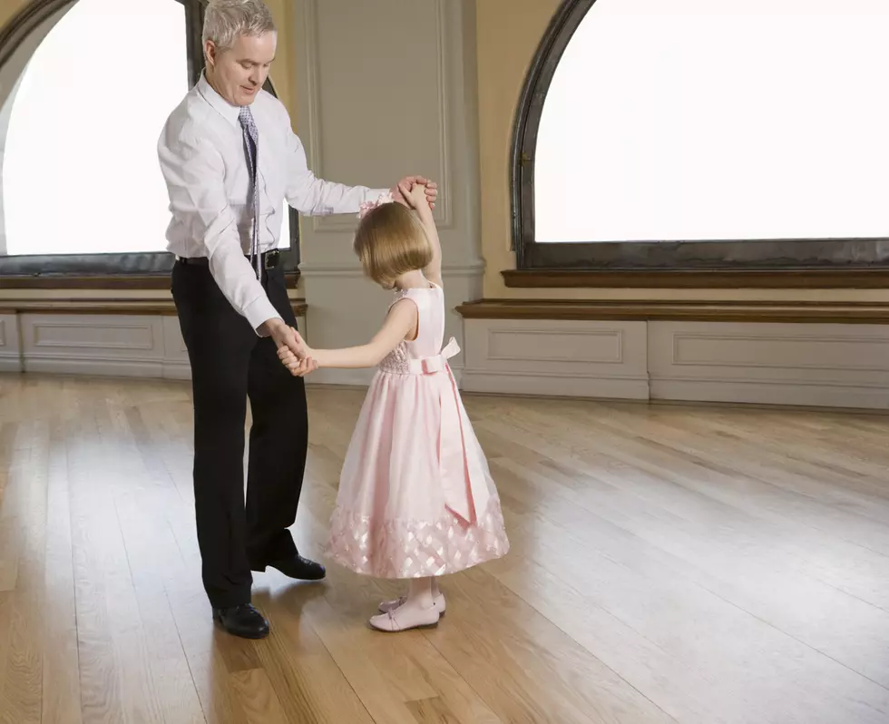 Father and daughter dancing