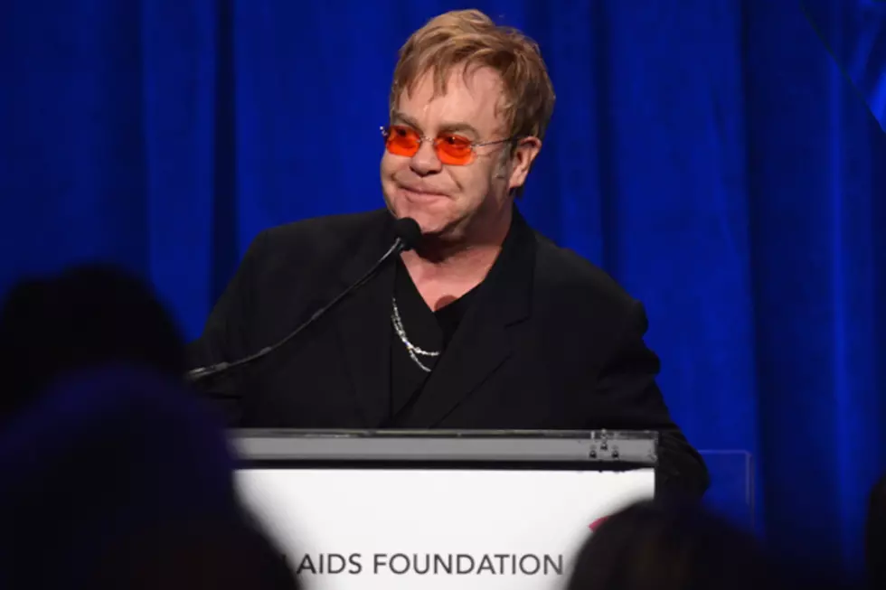 Elton John Commits a Horrific Fashion Faux Pas by Wearing a Tasteful Suit