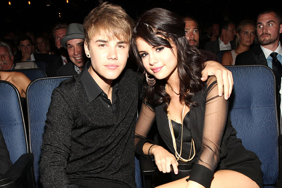 Justin Bieber + Selena Gomez Split as He Wades Into a Sea of Lingerie Models [PHOTO]