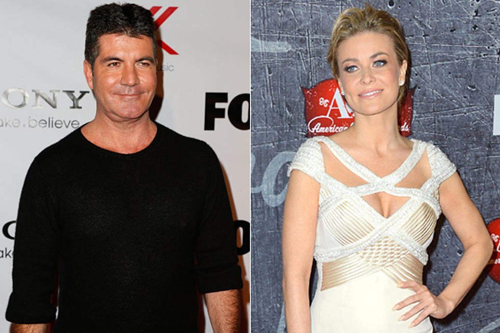 Simon Cowell + Carmen Electra Are Officially a Thing. Well, Sort Of.