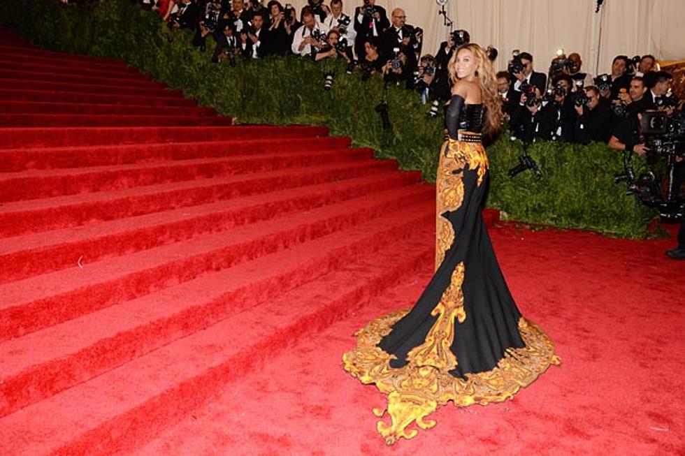 2013 Met Gala – Beyonce Stumbles in Black + Gold Givenchy