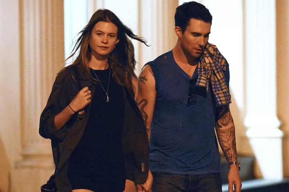Behati Prinsloo Flashes Her Ring + Describes How Adam Levine Popped the Question [PHOTO]