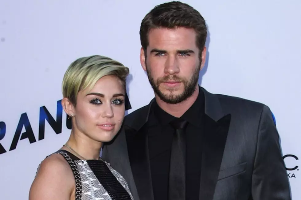 Miley Cyrus + Liam Hemsworth Attend &#8216;Paranoia&#8217; Premiere Together [PHOTOS]