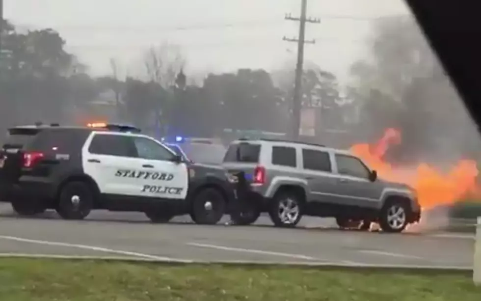 Stafford Cop Car Pushes Flaming SUV From Drive-thru