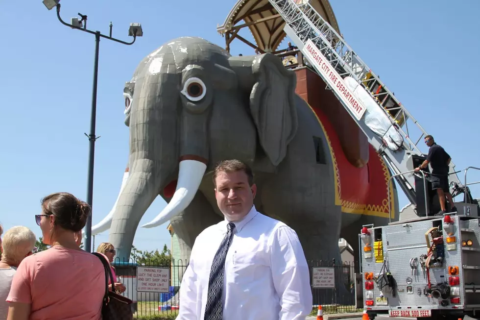 Don P. Hurley Photo. Michael Ruble with Lucy The Elephant.
