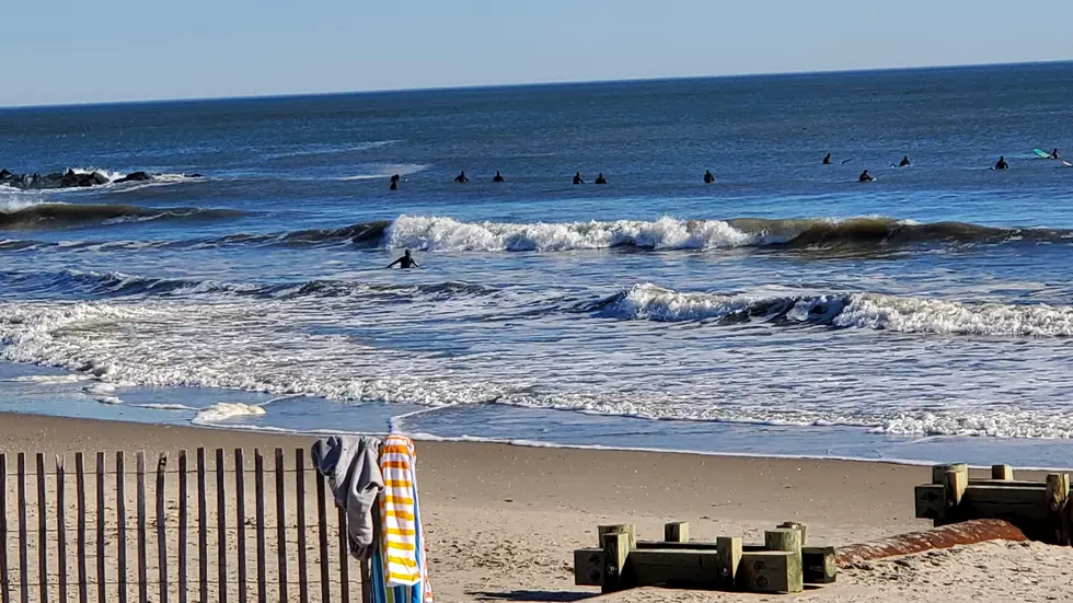 Surfers in Ocean City on January 1, 2023 - Photo: Chris Coleman