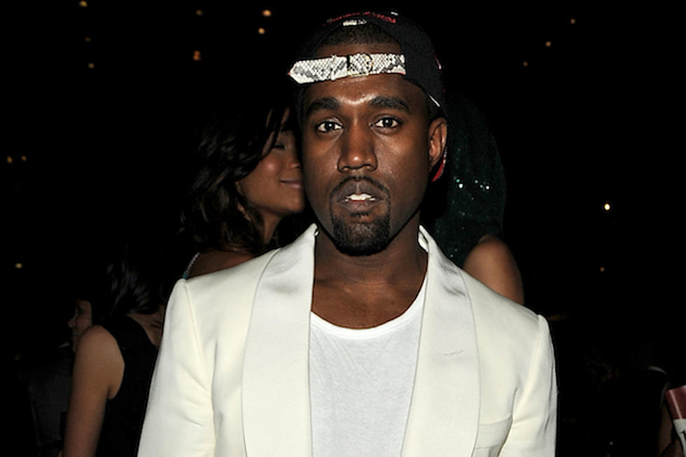 Kanye West Wears Straitjacket and Mask at Middle East Concert