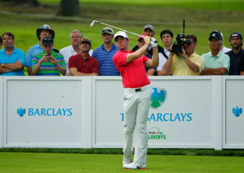 McIlroy Trails By 9 After Day One