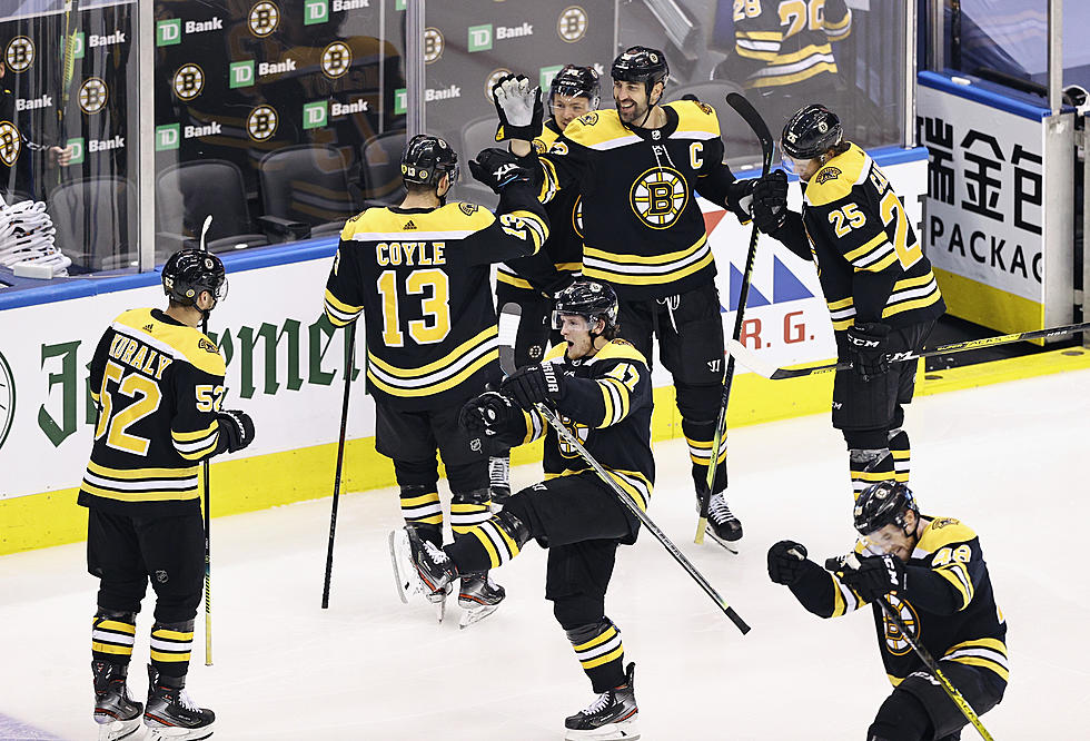 Bruins beat Hurricanes 4-3 in 2 OT in game delayed 15 hours
