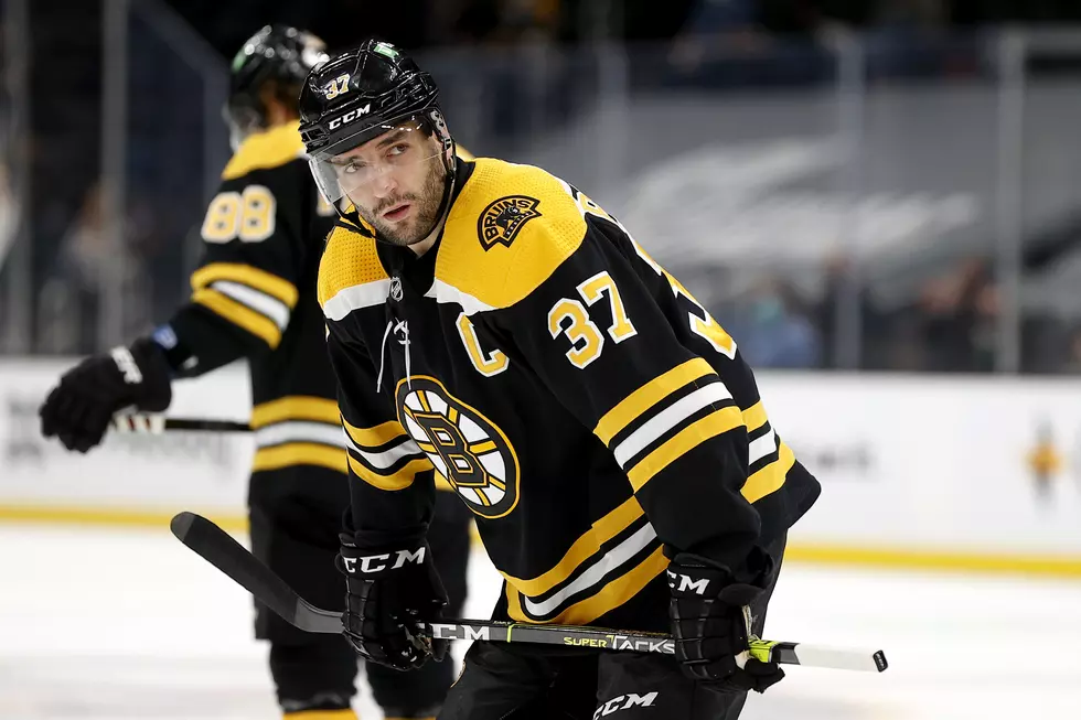 Bergeron, Bruins blank Devils to clinch playoff spot