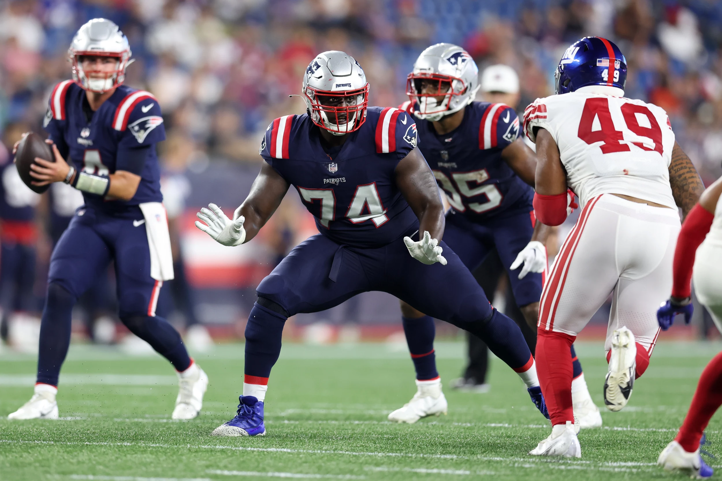 The New England Patriots defense signals that they recovered News Photo  - Getty Images