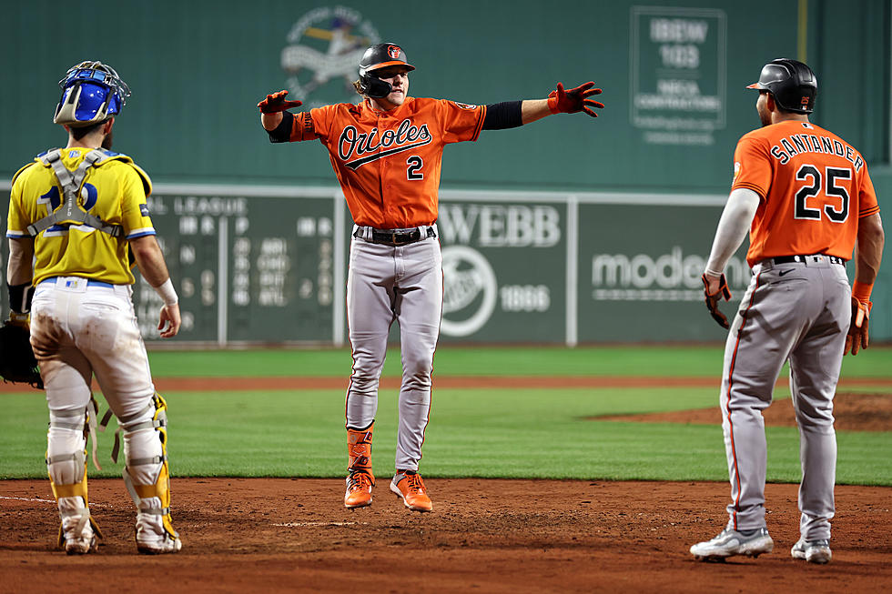 Orioles Hang on to Beat Red Sox 13-12 for 7th Straight Win as McCann Homers Twice