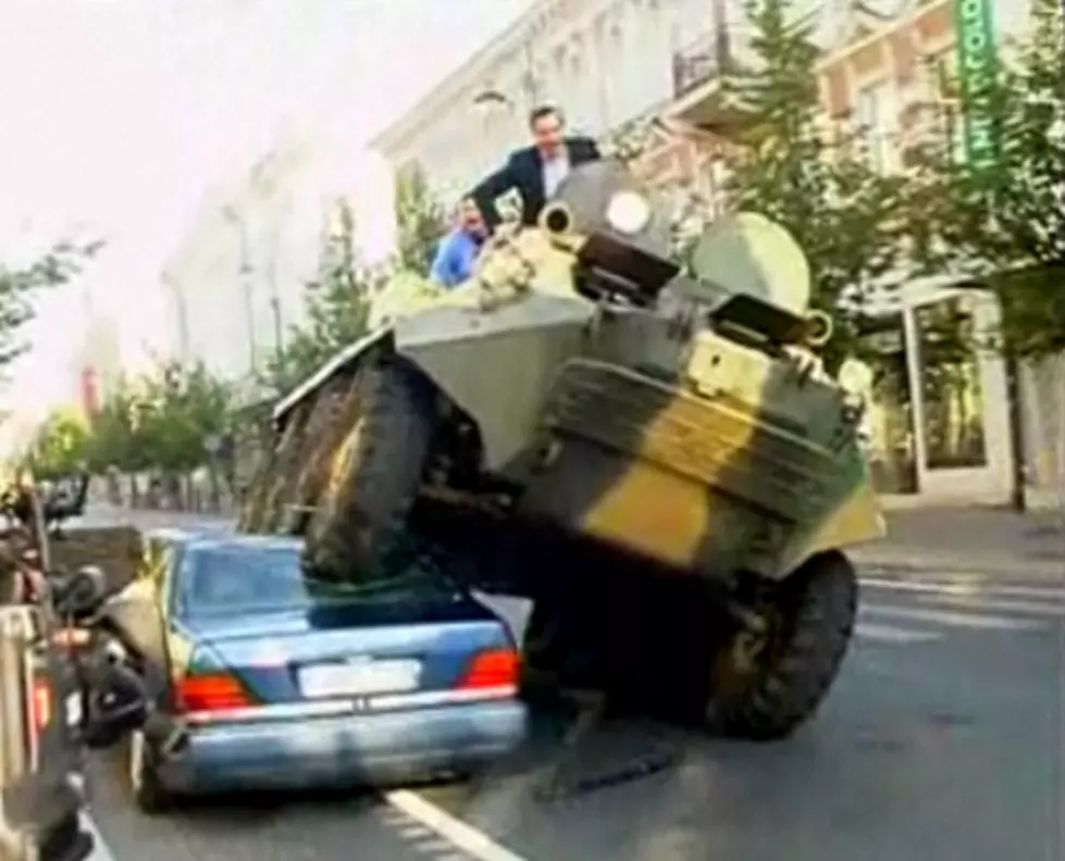 Mayor Crushes Illegally Parked Cars With A Tank! [Video]