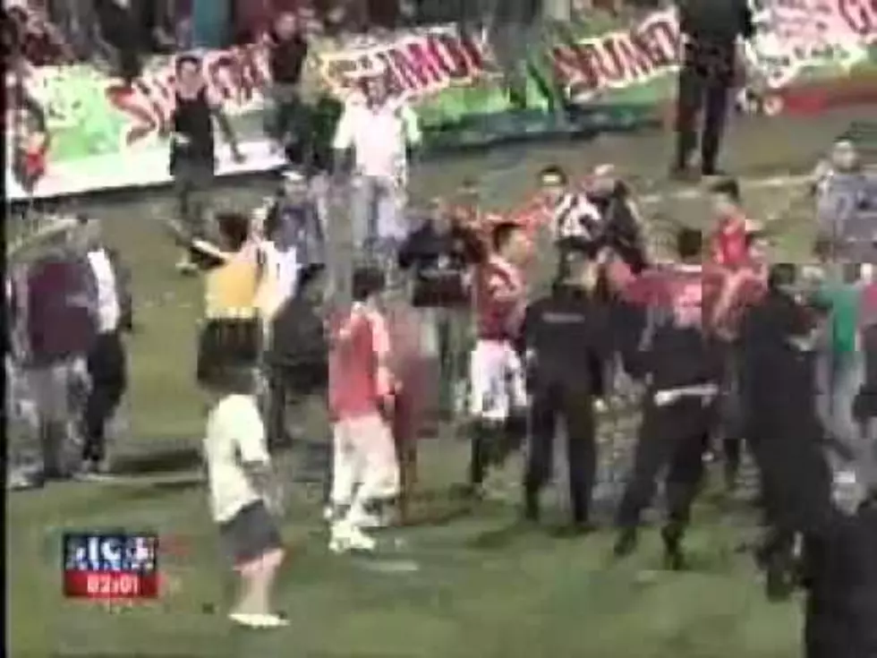 Police Brutality? Police Pop Fan, Get Popped By Mob [VIDEO]
