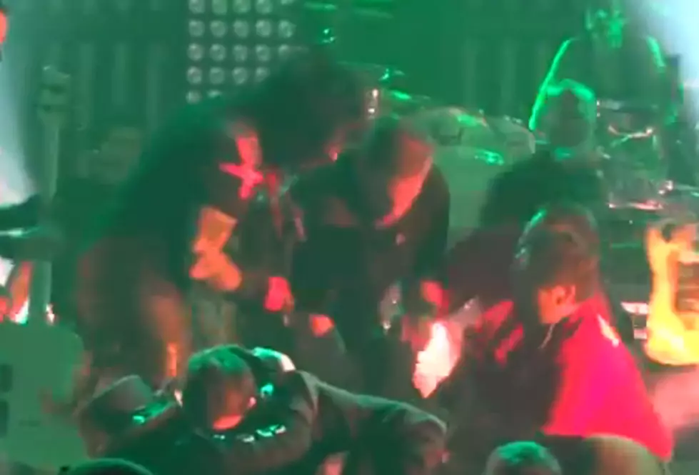 Motley Crue&#8217;s Tommy Lee Yells at Stage Crasher Who Knocked Guitarist to the Ground [Video]