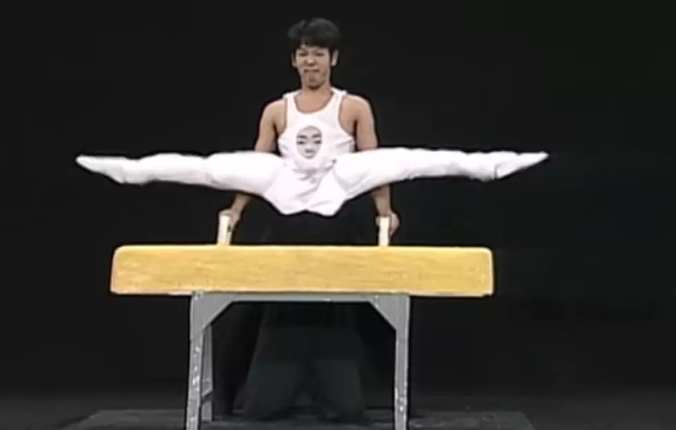 Two Men Acting As A Gymnast On A Pommel Horse [VIDEO]