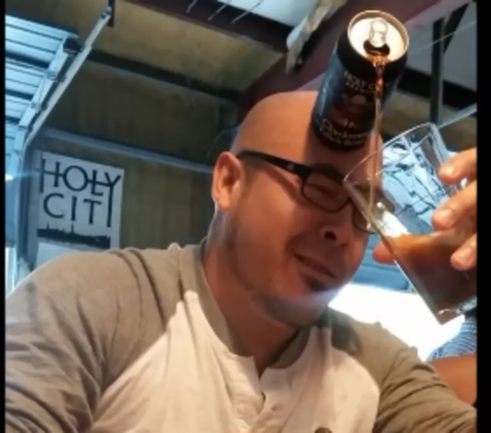 Guy Magically Pours Beer With His Forehead