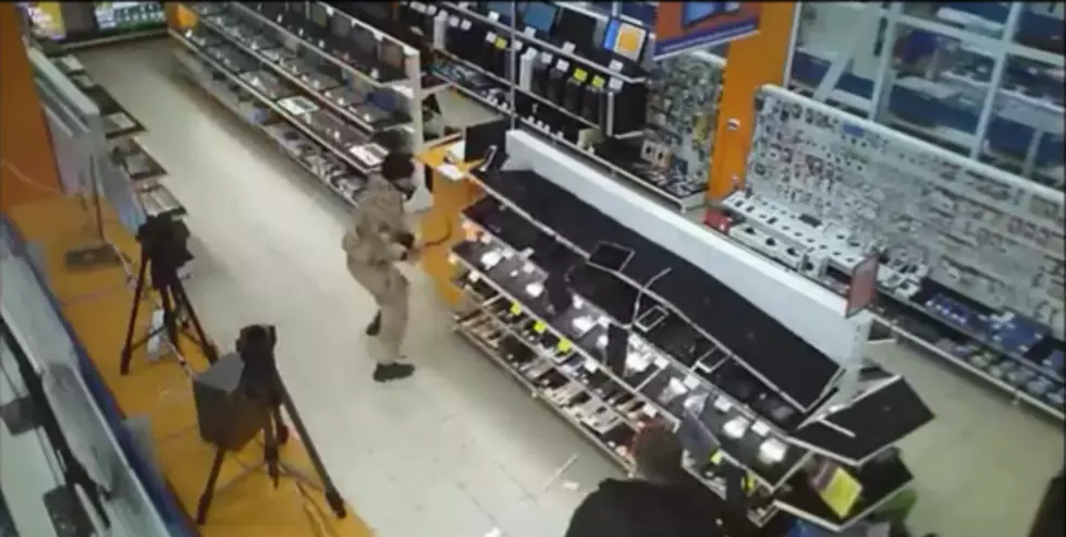 Guy Destroys Entire Electronics Store With Crowbar and No One Knows Why