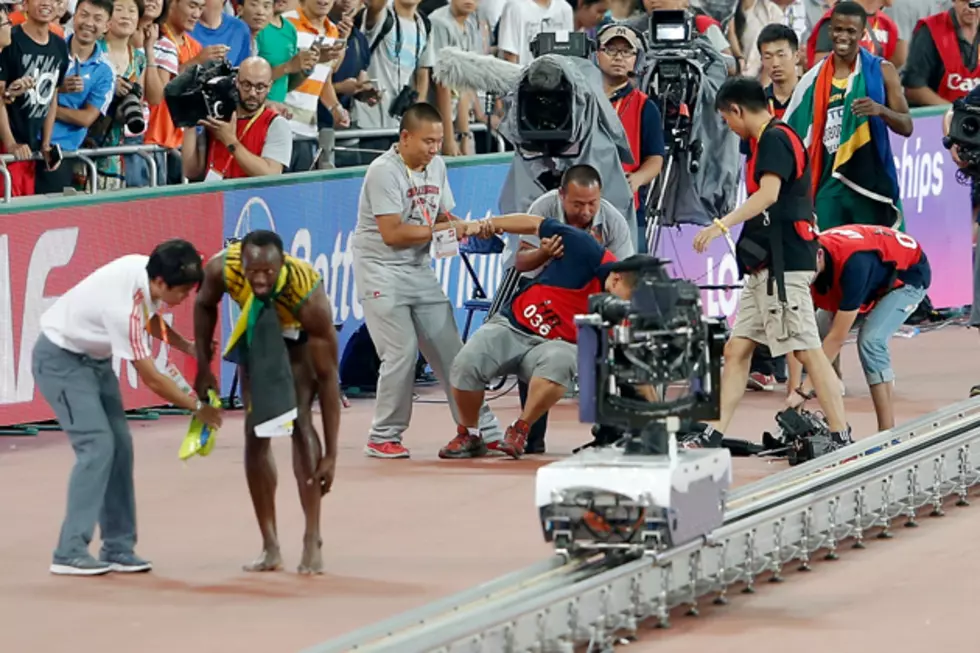 Usain Bolt Knocked Down By Cameraman on Segway