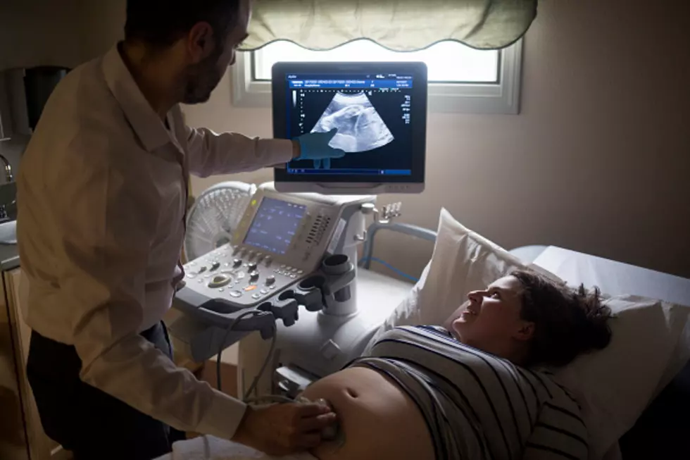 Unborn Baby Smiles and Waves For 4D Ultrasound