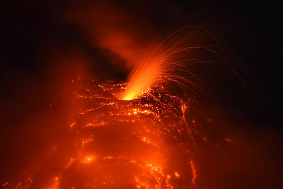 Scientist Takes A Sample Of Lava From Mount Nyiragongo