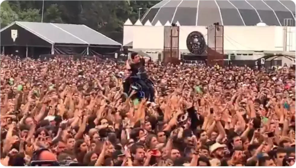 Arch Enemy Concert Goers Help Man in Wheelchair Crowd Surf