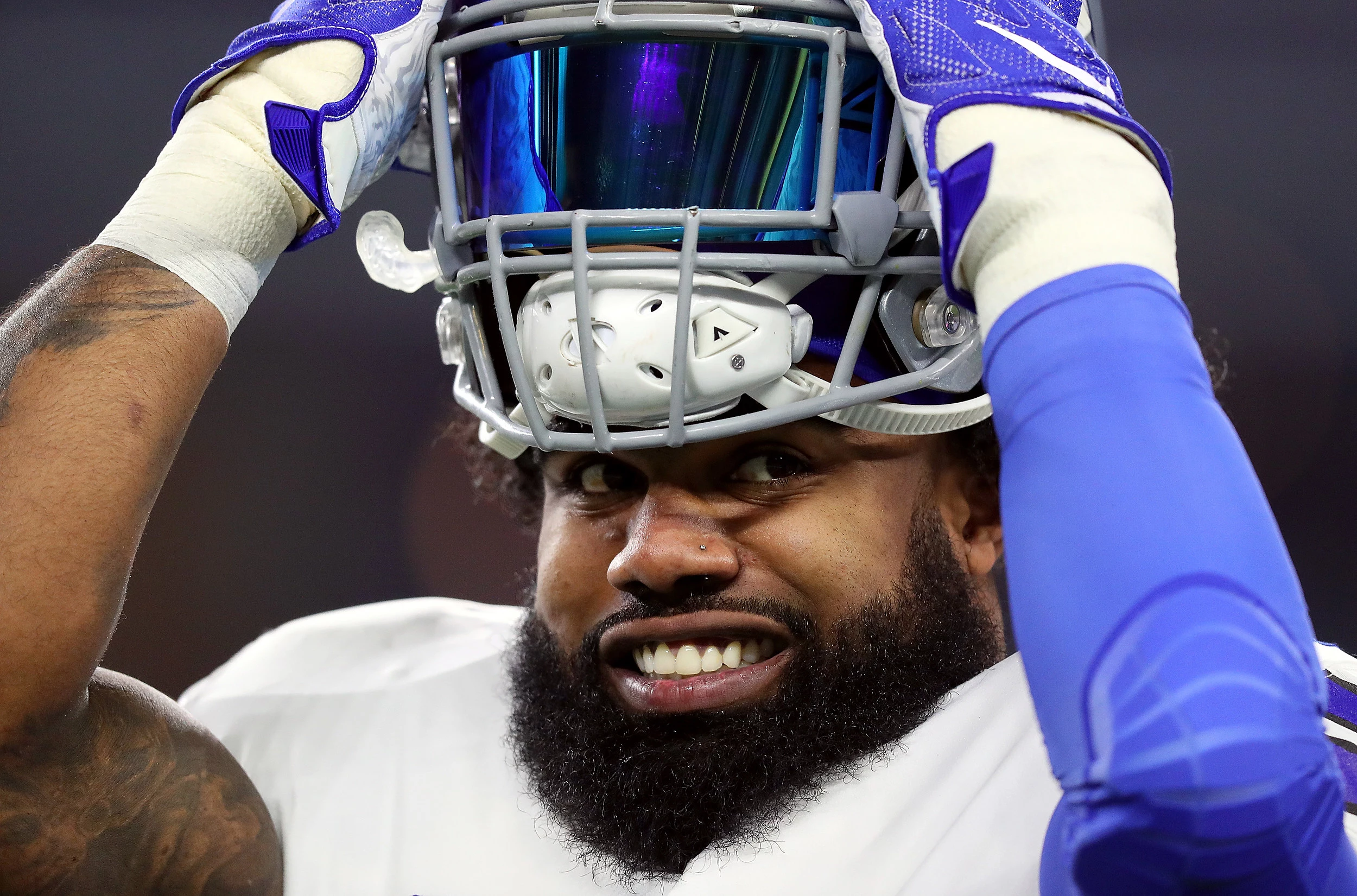 NFL fines Ezekiel Elliott for throwing money, Dak Prescott into Salvation  Army kettle