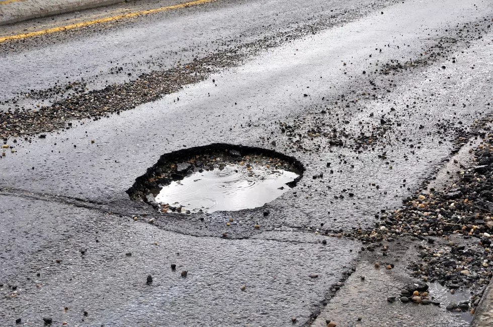 Pedestrians Unaware of Deep Puddle