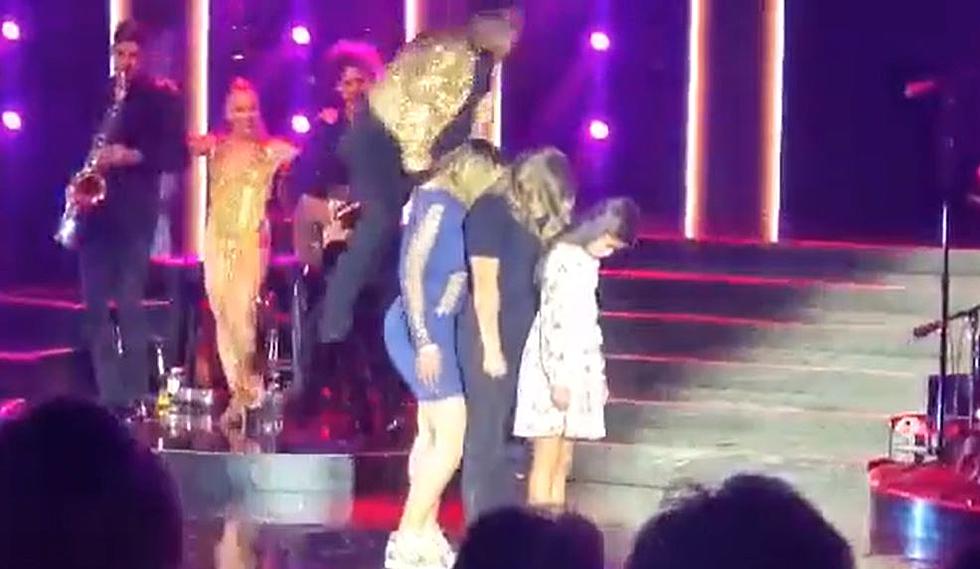 Watch This Famous Celebrity Hop Over an El Paso Woman on Stage